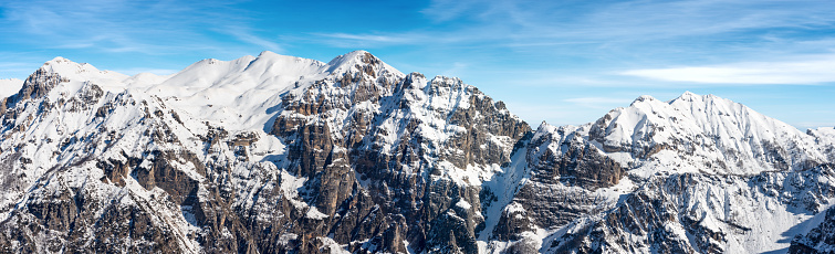 Mountain range of Monte Carega in winter with snow, also called the Small Dolomites (Piccole Dolomiti) from the Altopiano della Lessinia (Lessinia Plateau). Veneto and Trentino Alto Adige, Italy, Europe.