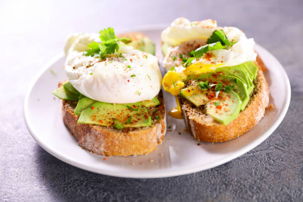 istock bread toast with avocado and poached egg 1305438327