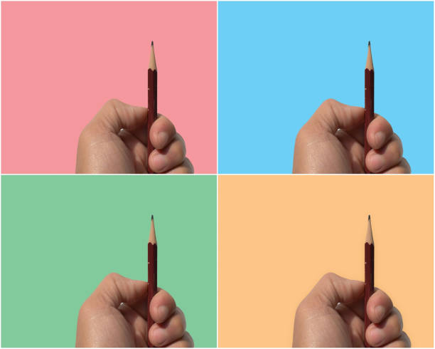 istock pencils on hand on colorful background 1305439185