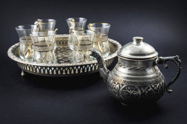 istock Metallic cup and Turkish glasses, a nice tableware of Arab origin 1305440445
