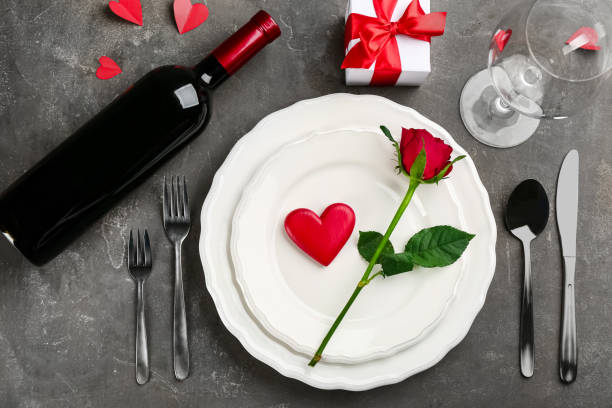 istock Beautiful table setting for Valentine's Day dinner on grey background, flat lay 1305440923