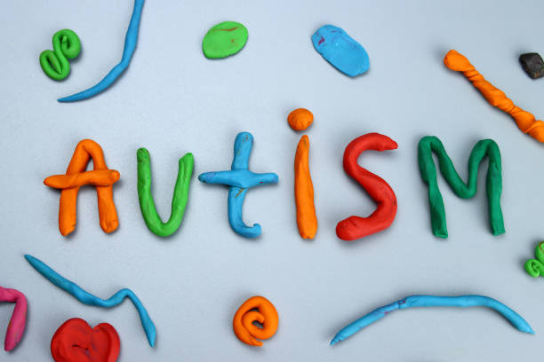 istock autism word from made of colored modeling clay or plasticine on a gray background 1305443861