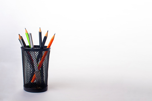 pencils in black pencil holder