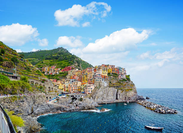 Manarola is one of the five towns that make up the Cinque Terre region in Italy. Composite photo