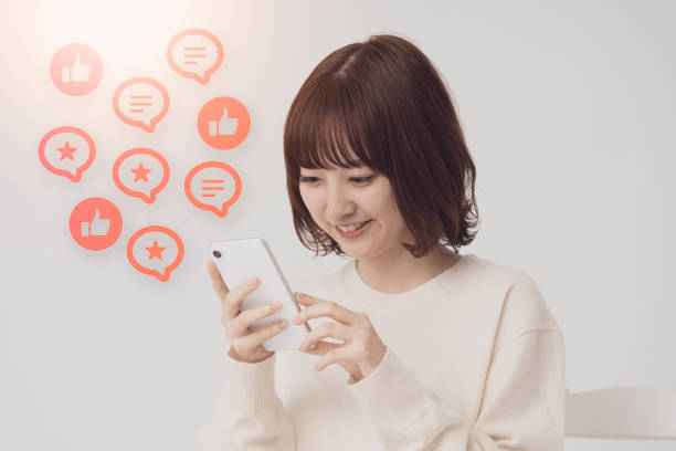 istock asian young woman uses a smartphone 1305449837