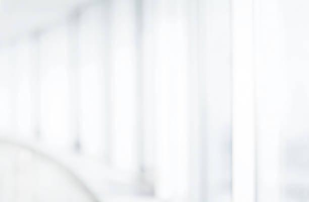 istock blurry image of an office with glass walls 1305449891
