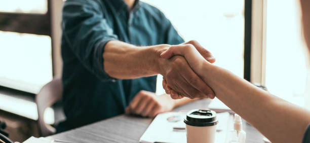 close up. financial partners confirm the transaction with a handshake stock photo