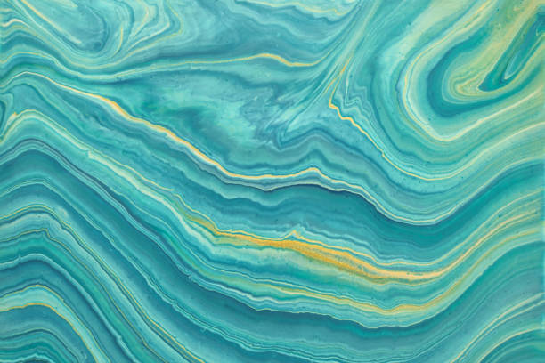 istock Abstract fluid art background blue and golden glitter colors. Liquid marble. 1305450076