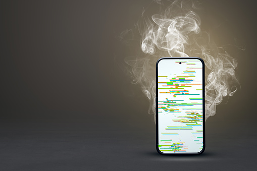 A standing smartphone with a glitched screen and smoke behind it. Neutral background with copy space.