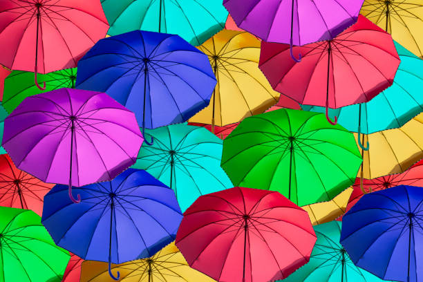 istock 3d,a multitude of open umbrellas 1305454278