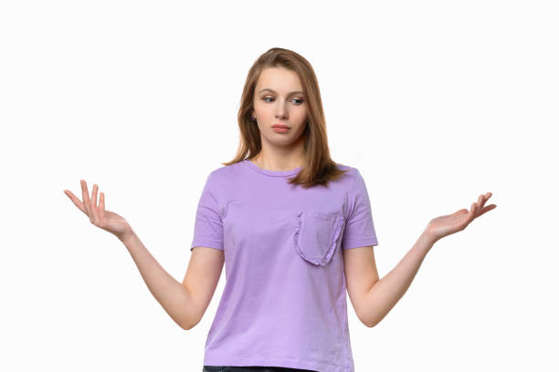 istock Young pretty woman having doubts confused shrugging shoulders 1305456595