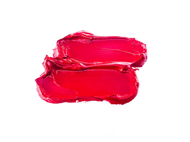 istock Red lipstick smear smudge on white, women's lips, love background, cosmetics composition, make up composition, lipstick brush strokes 1305457895
