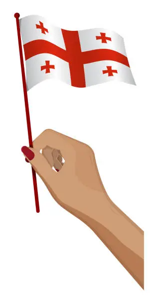 Vector illustration of Female hand gently holds small flag of Georgia. Holiday design element. Cartoon vector on white background