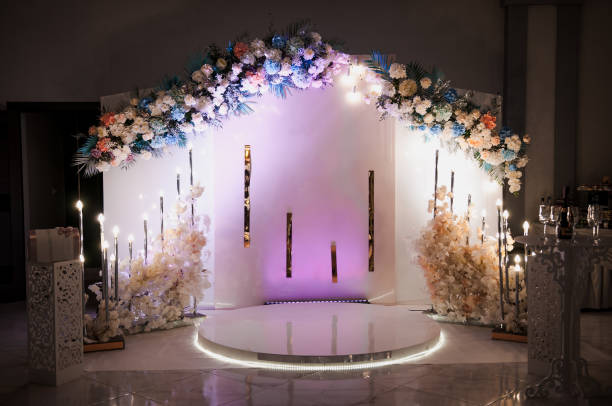 istock Wedding arch with multi-colored flowers. Wedding decorations 1305462538
