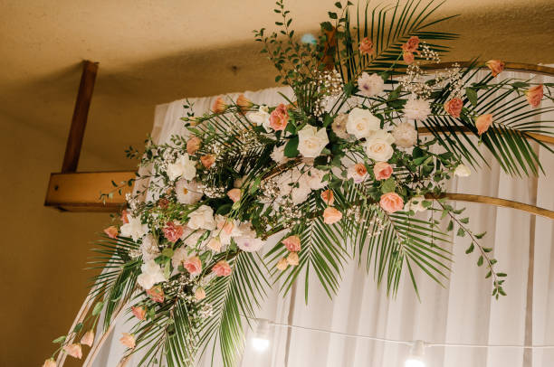 istock Wedding arch with multi-colored flowers. Wedding decorations 1305462593
