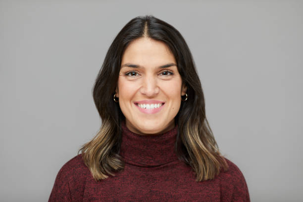 Front view portrait of a Spanish beautiful woman. Studio portrait of a young woman shot against a plain background.
Made in Barcelona.
Spanish model.
Front view portrait of a Spanish beautiful woman. headshot stock pictures, royalty-free photos & images