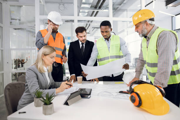 istock Diverse high-skilled multiethnic people creating project of building 1305462937