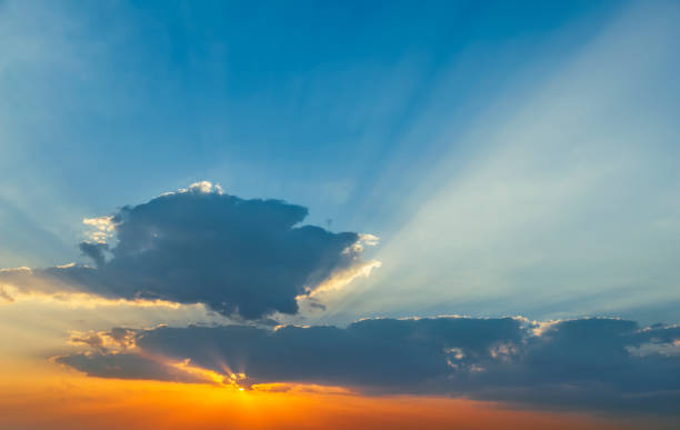 istock Stunning sunset with orange and blue clouds in dramatic sky 1305463902
