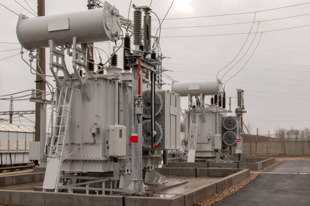 istock Electrical transformers: equipment used to step up or step down voltage, high voltage power plant. Side view. 1305472619