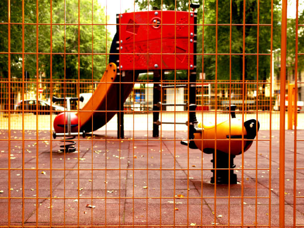 istock Children playground at sunset 1305474117