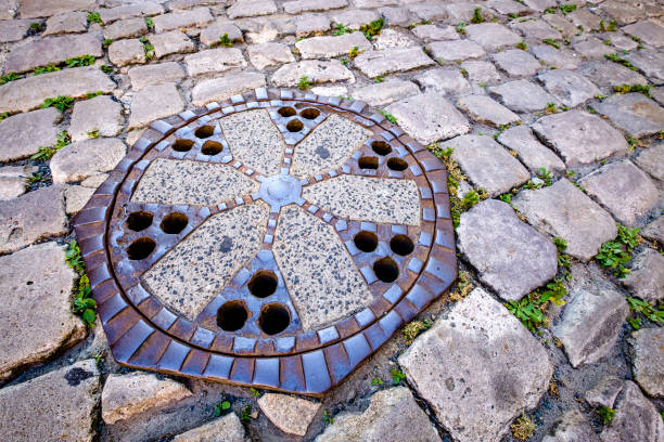 istock old manhole at a street 1305474594