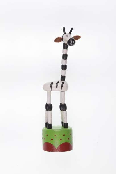 istock toy wooden giraffe isolated on white background 1305477582
