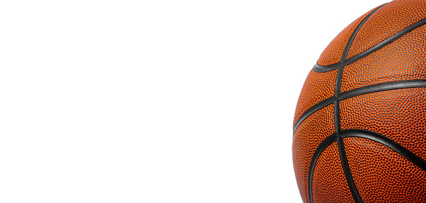 Closeup detail of basketball ball texture background. Team sport concept. Sports modern banner