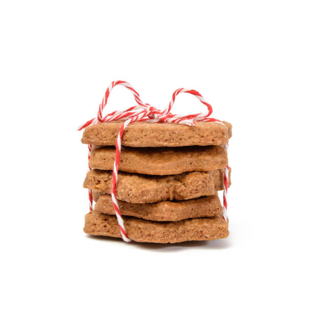 istock stack of star shaped baked chocolate gingerbread cookies tied with red rope 1305485008