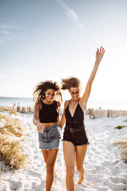 istock happiness friends together at the beach 1305486315