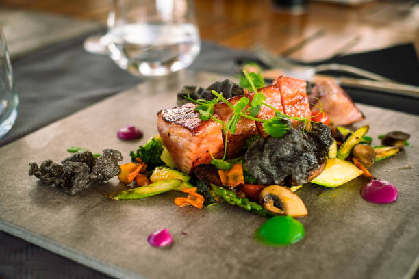 istock Mini tuna steaks with microgreens and potato side dish on a ceramic plate 1305489193
