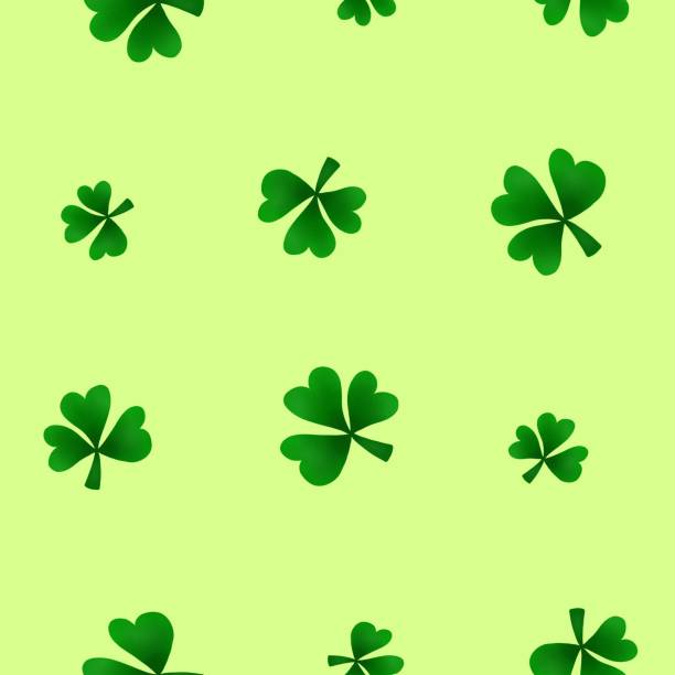 istock Bright seamless shamrock clover pattern. Plant background of abstract, textured clover leaves. 1305489716