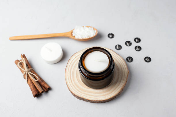 istock Basic set for home-made natural white eco soy wax candles in glass, wick, perfume. Idea for a hobby, business. Making trendy diy candles without harm to health on white background. 1305492221