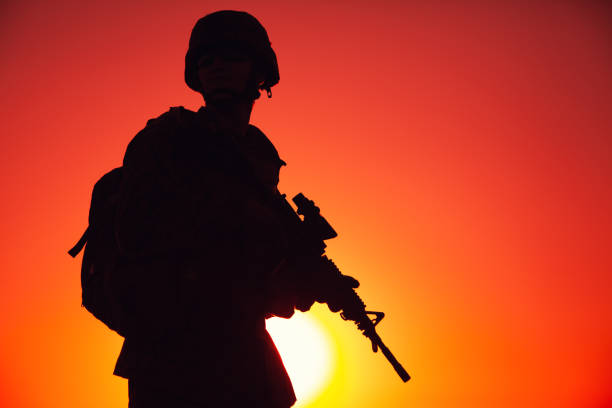 istock Anti-terrorist forces soldier patrolling beach 1305492557