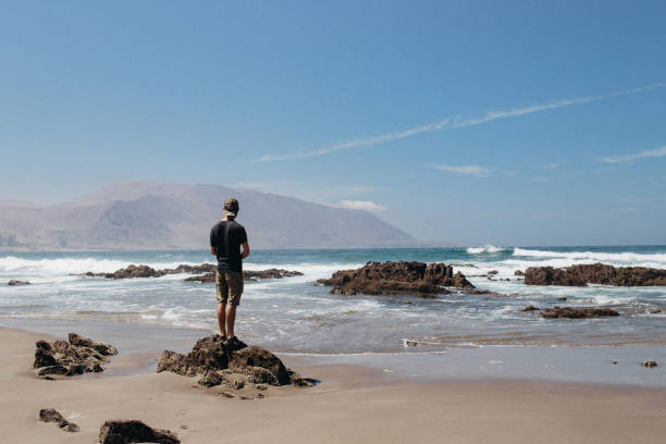 Man looking at beautiful ocean view