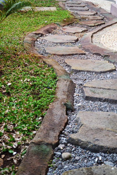 istock stone stacked into the path of a park 1305493857