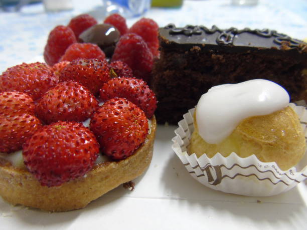istock Sweet cakes with fruits and chocolate 1305494980