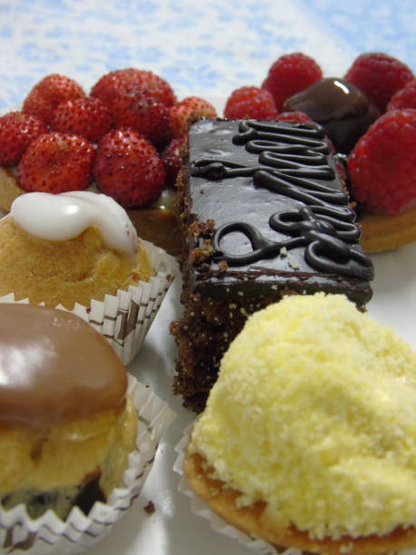 istock Sweet cakes with fruits and chocolate 1305494987