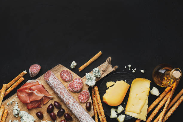 istock Italian appetizers on dark background 1305496225