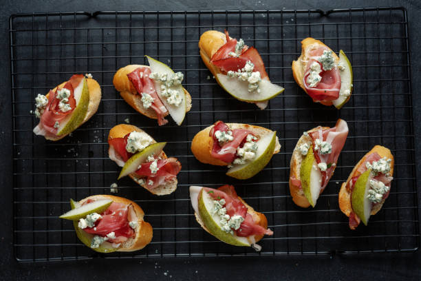 istock Italian appetizers on dark background 1305496914