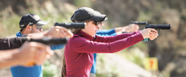 istock Young people on tactical gun training classes. Shooting and Weapons 1305500671