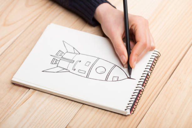 istock Artist drawing an anime comic book in a studio. 1305502529
