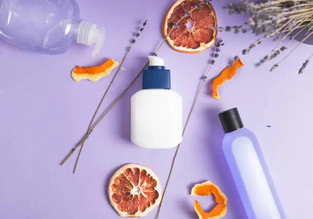 Cosmetic bottle beauty treatment with a dry lavender and orange dry.