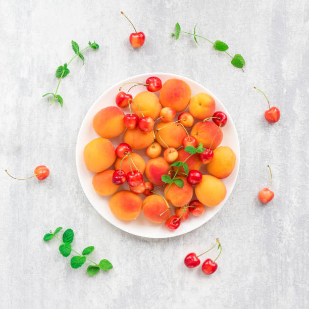 istock Summer fruits on grey background, flat lay, top view 1305503031