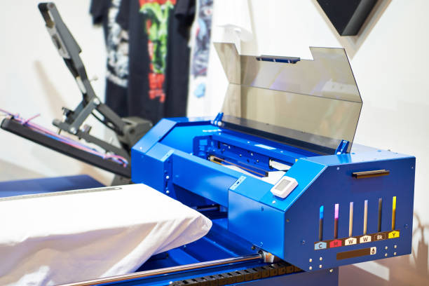 istock T-shirt and fabric printer 1305504116
