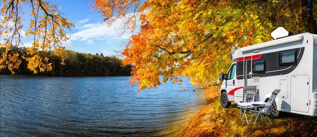 Holidays in Poland - leisure with a camper van in autumn by the lake in Masuria, land of a thousand lakes