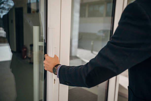 istock Businessman entering office building 1305512590