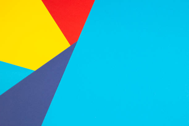 istock Color papers geometry flat composition background with yellow, red and blue tones 1305513006