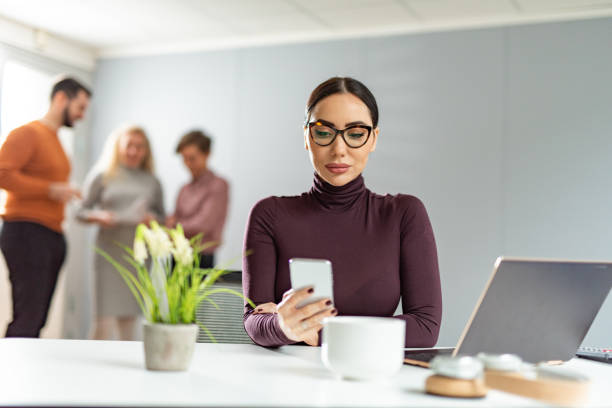 istock Serious businesswoman working in office. 1305515660