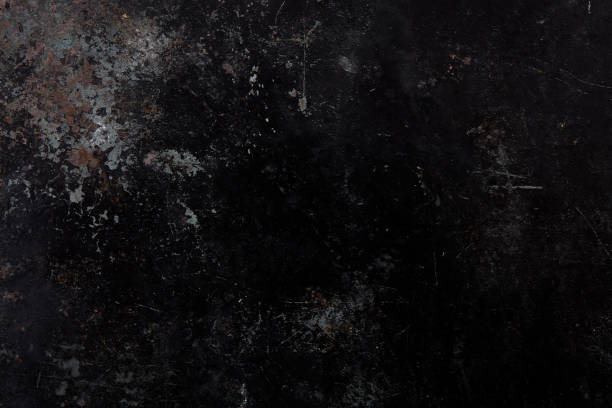 istock Black, old and corroded metal texture background 1305515710