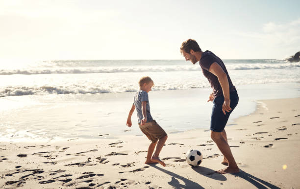 istock I'm a good player thanks to my Dad 1305522793